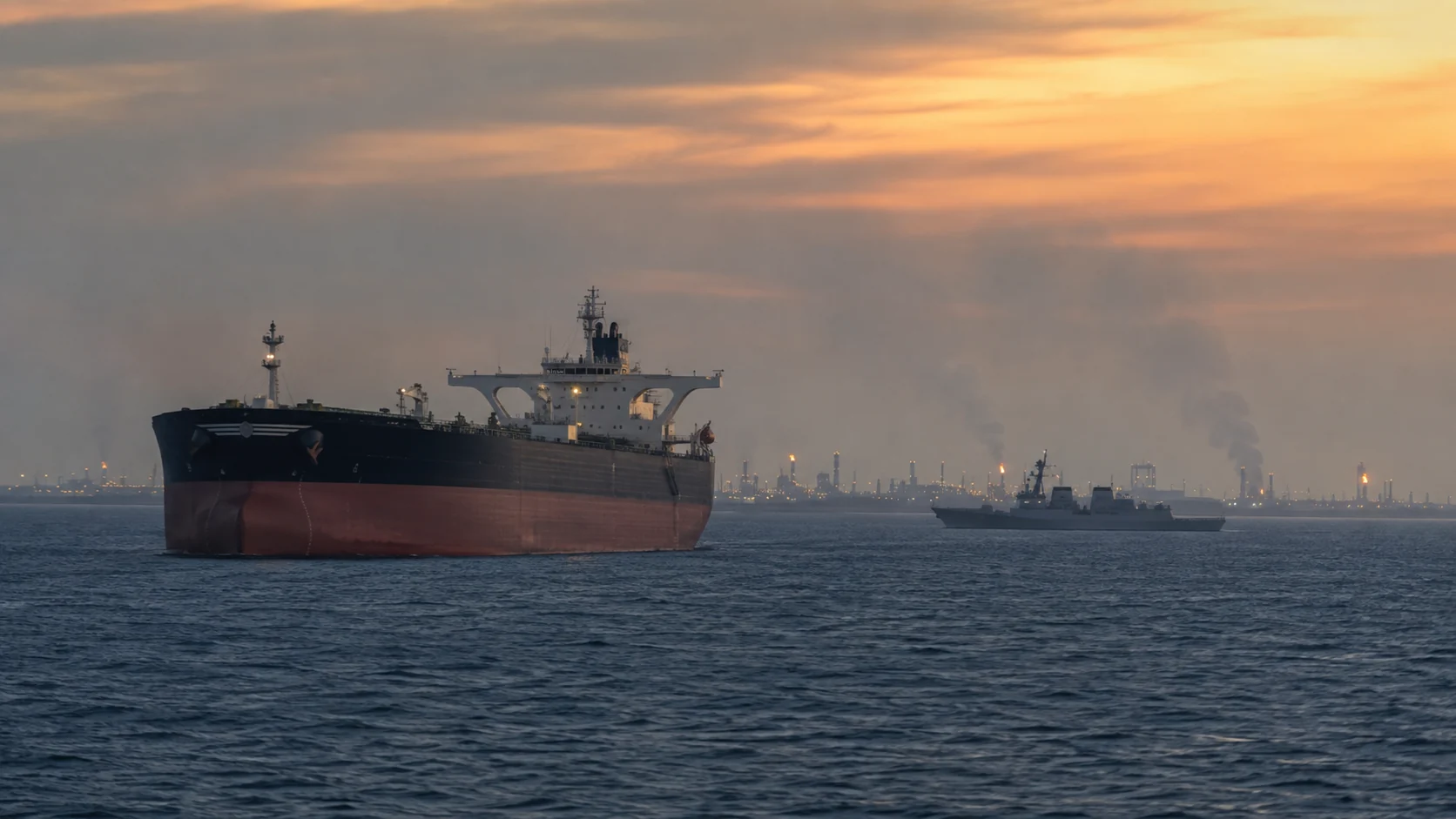 Illustration of an oil tanker and naval vessel in the Gulf as US-Iran tensions rise